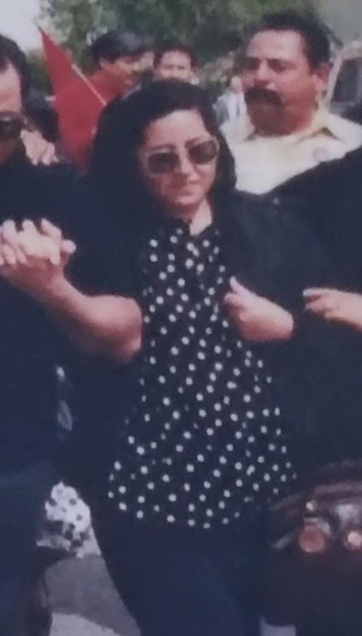 Father behind Helen Chavez after Cesar's fast